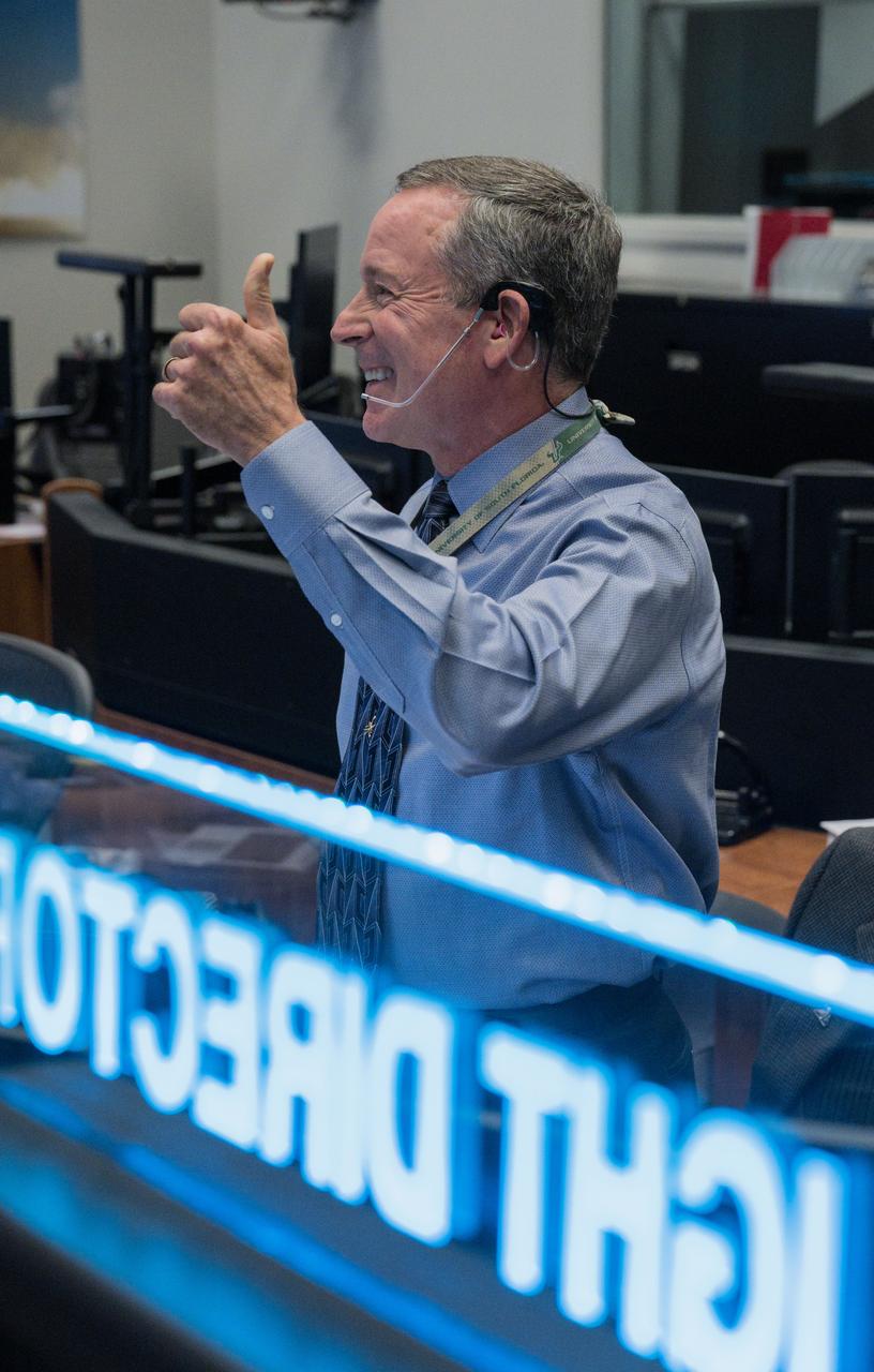 (jsc2022e089777) (Nov.25, 2022) During flight day 10 of the of the 25.5-day Artemis I mission, Lead Flight Director Rick LaBrode has a thumbs up as he monitors the progress of the Distant Retrograde Orbit Insertion (DRI) burn. The Distant Retrograde Orbit Insertion (DRI) burn, inserted Orion into a Distant Retrograde Orbit (DRO) where at it's furthest distance Orion will be nearly 270,000 miles from Earth.